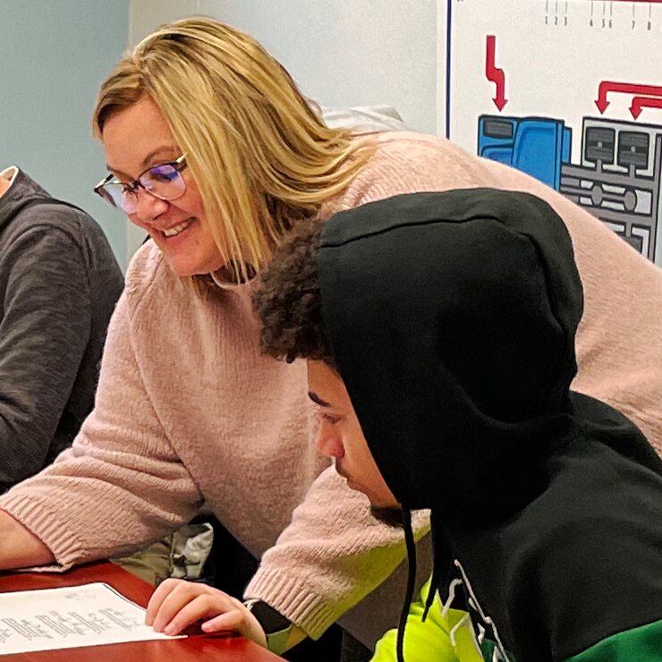 Shawna helping a student